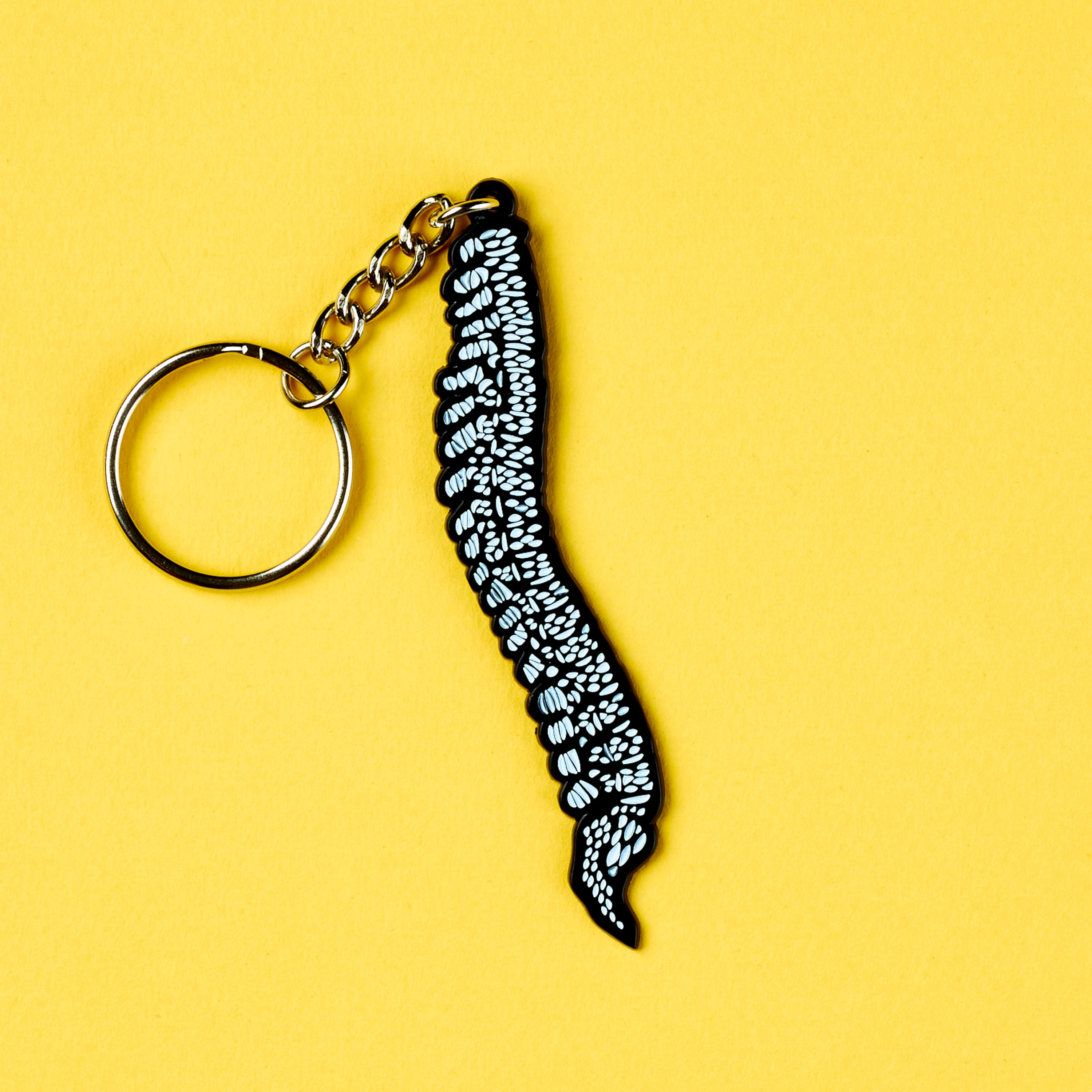 Spine Enamel Keychain