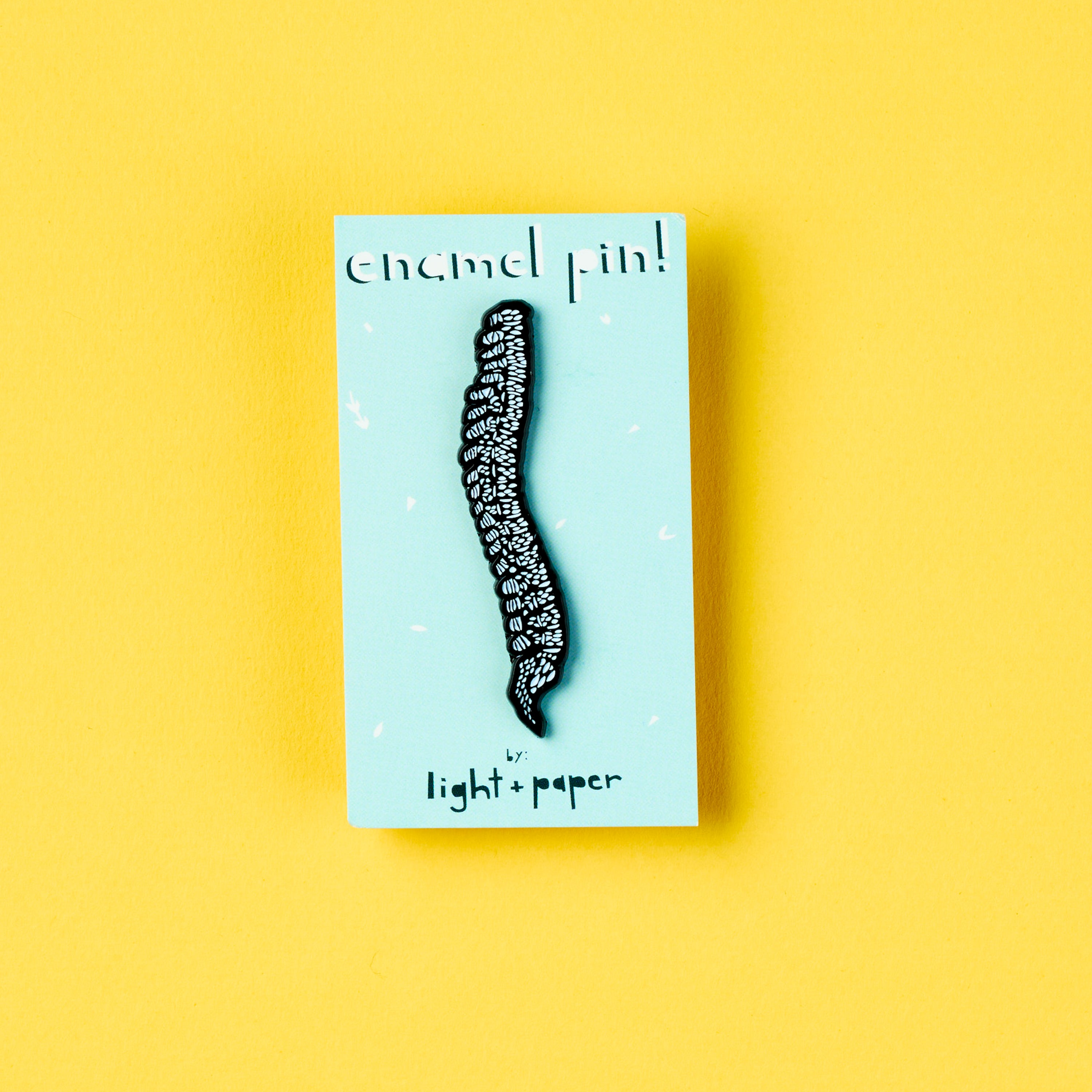 Spine Enamel Pin