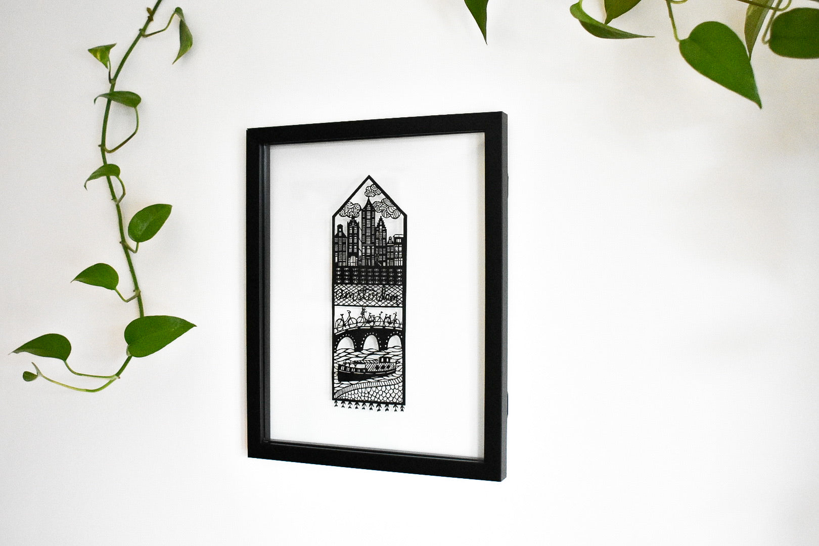 Papercutting art by Ali Harrison of Light + Paper, Lasercut Amsterdam Travel Papercutting, Made in Toronto