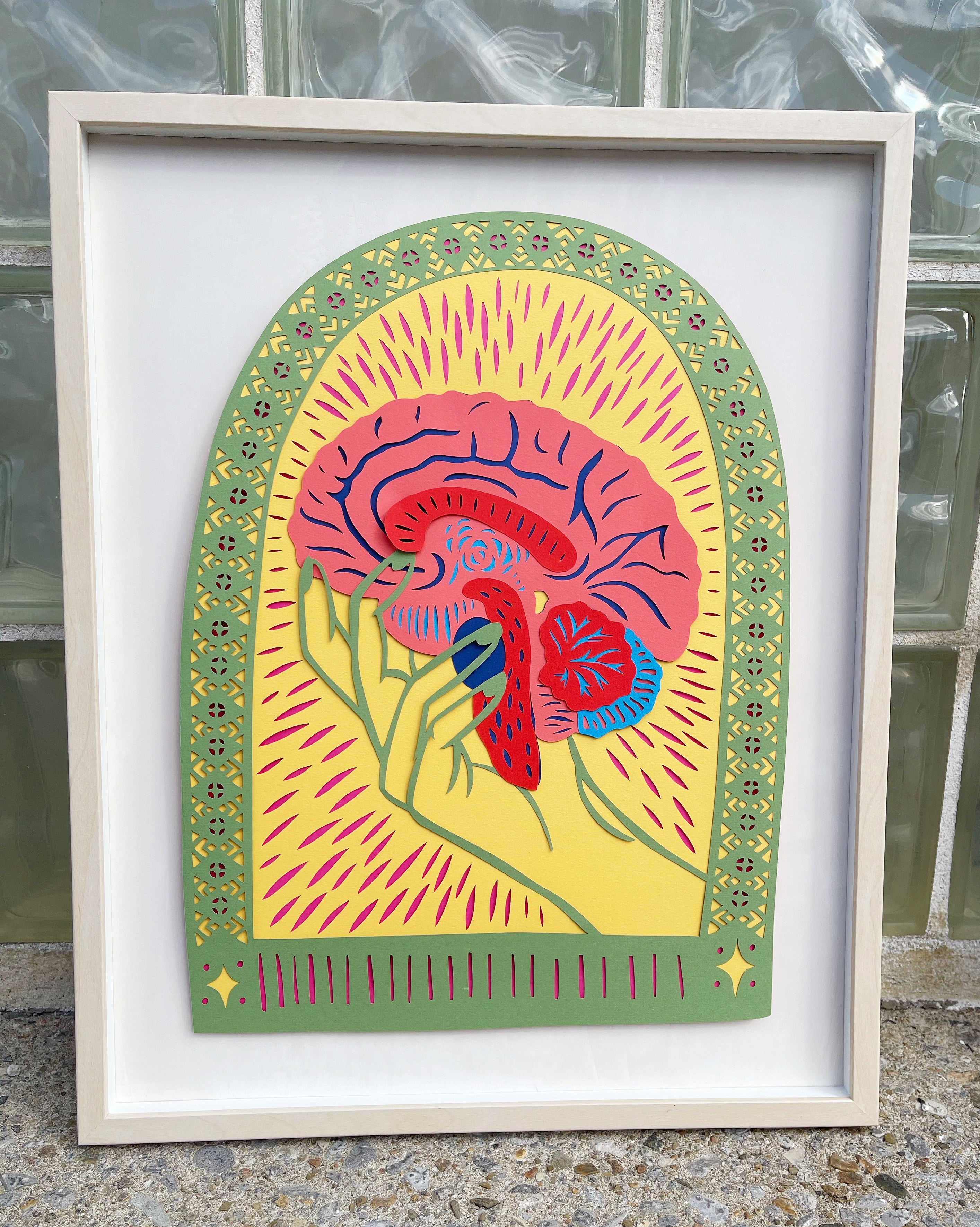 Colourful Held Brain Papercutting